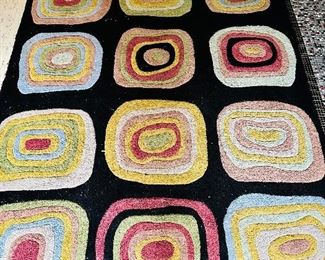 Woven rug in the style of Kandinsky