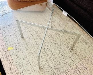 Mid Century “Barcelona” style glass and chrome coffee table.