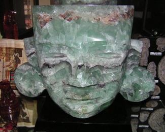 Flourite Toltec Head 16 inches tall x 18 inches wide, plus a 2 inch polished piece of black obsidian on which it sits. Hand-carved by Alberto Hernandez of the Dreaming House at Teotihuacan, Mexico. One of many pieces of his available!