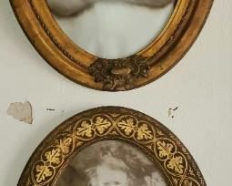Several large oval frames with bubble glass. All c 1920 or earlier. Between 18 to 24 inches long, Some wood, some gold leaf such as these.