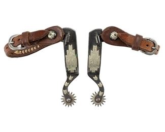 Silver mounted cowboy spurs, 16 point rowels, decorative stitching on leather straps

