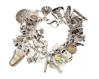 Western theme sterling silver charm bracelet with 32 charms including James Avery Alamo, State Seal and Canteen
