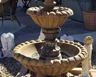 3-tiered cement water fountain.