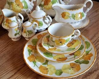 Yellow flower dish set. This is a part of it. The other pieces are in the cabinet.