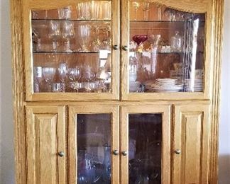Beautiful glass lighted display cabinet with tons of storage
