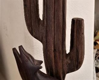 Ironwood sculpture cactus and coyote