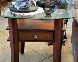 Matching sofa end tables with drawers.