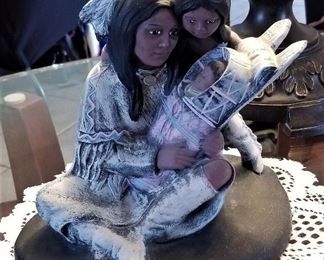 Native American woman and children