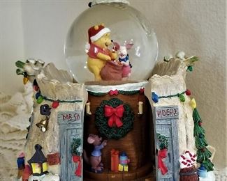 Winnie the Pooh snow globe that opens. Musical.