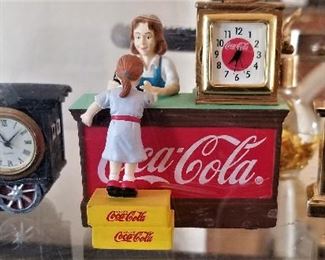 Collectible clocks. Train clock and Coca-cola clock