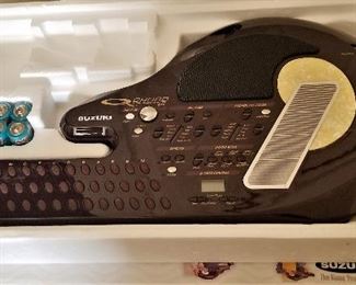 Suzuki QC-1 | Q-Chord Digital Song Card Guitar