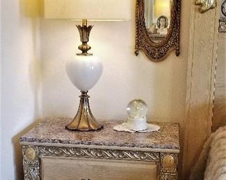 Neutral bedroom set with electric sleep number king bed, 2 matching bedside dressers, tall bureau, and wide dresser with mirror. Hollywood Regency matching lamps.