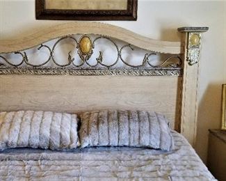 Neutral bedroom set with electric sleep number king bed, 2 matching bedside dressers, tall bureau, and wide dresser with mirror. 