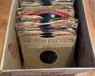 Approximately 50 records playable on the Victrola… will be included with it, so please bid accordingly. These will be priced in the box to help you determine an appropriate bid; they will NOT be sold individually. 