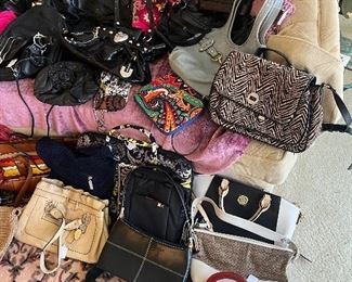 Coach, Dooney and Bourke, Michael Kors, Steve Madden, vera Bradley, and this is just a fraction of the handbags.