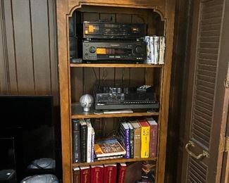 Books and stereo, equipment, cassette tapes, American flag