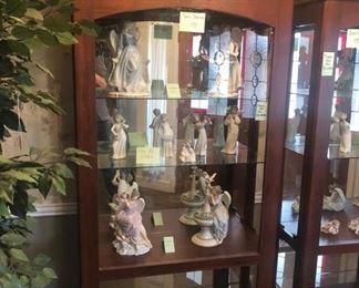 And another pair of matching curio cabinets - also full of Lladro!