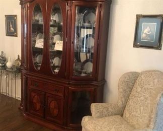 The matching china cabinet w/ beveled oval glass and serpentine curved glass side doors!