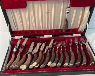 Antique Charles Clements Sheffield cutlery set. (9 knives & 10 forks) . Original box never used Stag Horn handles with sterling silver bottoms.