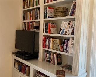 Books, flat screen TV