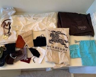 Various dust bags and hang tags