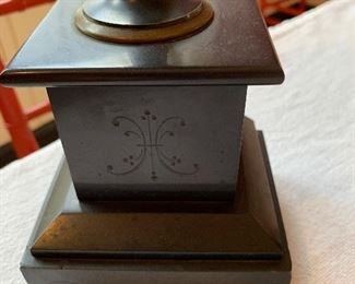 Black stone bases on 19th century urns