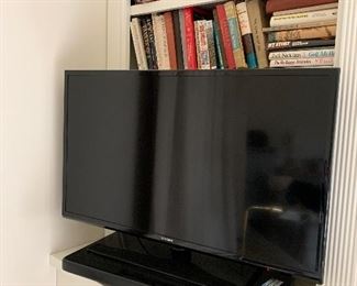 Large TV; 3 smaller ones