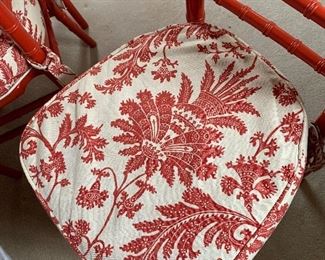 Custom cushions on red chairs