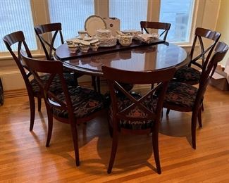 Grange, made in France, dark cherry 53" round table + 8 matching chairs, includes 3 - 20" leaves and custom table pads
