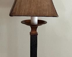 There are two of these carved bird finial lamps