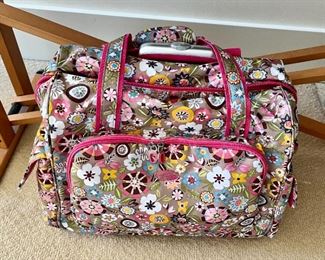 Cute Olympia suitcase / travel bag with wheels and hidden handle