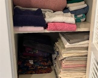 Sheets & pillow cases in hall closet