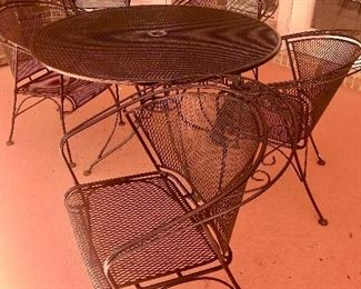 Vintage Woodard Wrought Iron table and 4 chairs