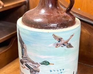 Beer Growler with Bird Motif.