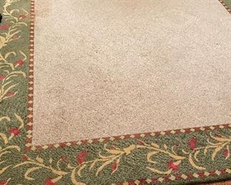 Stark Area Rug with Green Border. Measures 15' x 8'. Will Need Cleaning. Photo 1 of 2.
