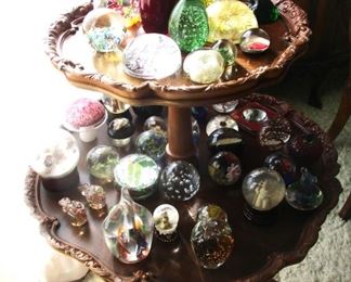 two tier mahogany table....loaded with glass paperweights