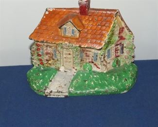 ENGLISH COTTAGE DOORSTOP.