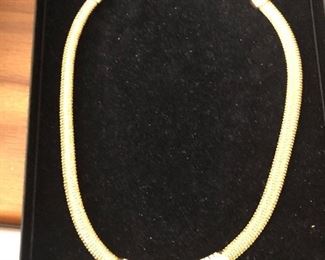 CHRISTIAN DIOR BRASS NECKLACE.