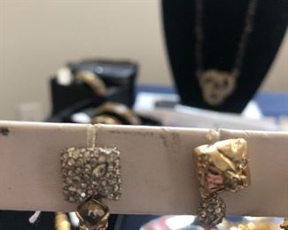 EARRINGS BY ALEXIS BITTAR.