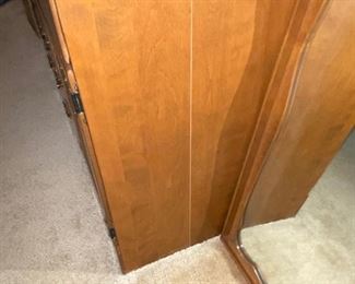 Crack on side of dresser. 