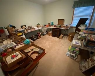 Dishes, decor, kitchen items, sewing machines with tables, kids games, lots of vintage items.  
