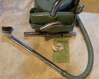 Vintage General Electric vacuum swivel top with attachments and manual