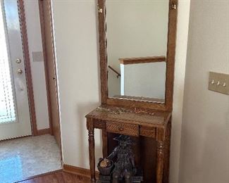 hall tree NOTE: the little girl and bench sitting under the hall tree.