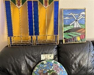 Good looking stain glass windows and lamp shade.