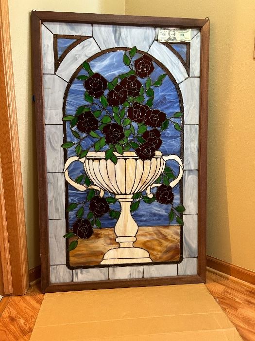 A beautiful framed stain glass lead window.                   
                     NOTE: the $20.00 bill for size comparison.