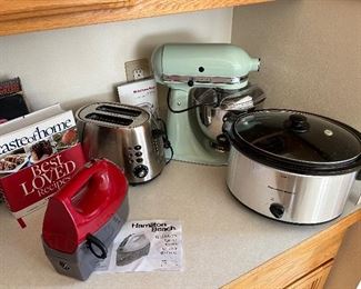 Artisan Kitchen Aid, Hamilton Bach slow cooker, 80 plus pcs Norleans dish set w/ wonderful serving dishes, toaster & Hamilton Beach iron.