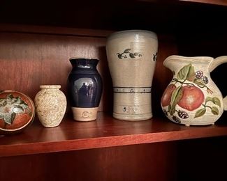 variety of ceramics and a couple of ROWE pieces.