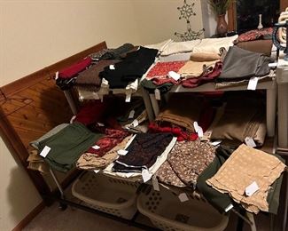 Just a sampling of all the hundreds yards of various fabrics for sale