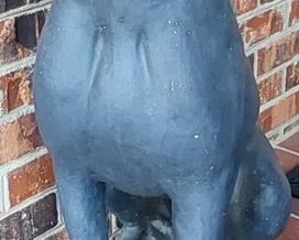 Large concrete dog figurine