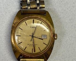 NC810 GOLD TIMEX WATCH, WATER RESISTANT AND AUTOMATIC, UNTESTED